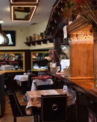 Restaurante Muñoz is a must-visit for anyone seeking authentic Segovian flavors. Located in the heart of Segovia, this restaurant offers a cozy ambiance and a menu bursting with regional specialties. Their roast suckling pig, a local delicacy, is exquisitely prepared. A perfect spot to unwind and enjoy the culinary heritage of Spain.