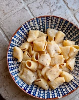 Al Dente Pastalab is a hidden gem in Amsterdam, renowned for its fresh, handmade pasta. You'll love the vibrant atmosphere and the skillful chefs creating your dish right before your eyes. Perfect for a casual dining experience, it captures the essence of Italy with a unique twist, making every meal a delightful adventure.