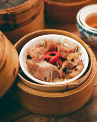 Lang's Cafe is a hidden gem in Wan Chai, where locals flock for its authentic Hong Kong flavors. The warm, inviting atmosphere and friendly service make it the perfect spot to enjoy classics like rice bowls and comfort foods. Don't miss their signature dishes and daily specials that keep patrons coming back!