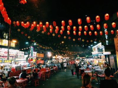 Jalan Alor Night Market is a food lover's paradise; it's bustling with locals and tourists alike. The array of street stalls offers tantalizing dishes from satay and grilled seafood to local desserts. The lively atmosphere, complete with open-air dining, makes it the perfect place to indulge in authentic Malaysian flavors while soaking in the vibrant energy of Kuala Lumpur.
