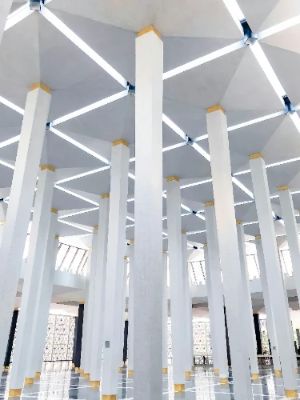 As a friend, I highly recommend visiting Masjid Negara. Its stunning modernist architecture, featuring a unique 16-pointed star roof, is a sight to behold. The peaceful ambiance allows for quiet reflection, making it a perfect escape from the city's hustle. Don't miss the beautifully landscaped gardens surrounding the mosque!