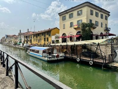 Visiting Navigli District in Milan feels like stepping into a picturesque postcard. The canals are lined with delightful cafes and quirky boutiques, perfect for a leisurely stroll. You’ll discover local art galleries and can enjoy aperitivo alongside the stunning waterways, making it a must-visit for anyone seeking Milan's creative vibe.