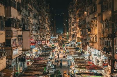 The Mong Kok Street Market is a must-visit for anyone seeking a genuine taste of Hong Kong life. Wander through colorful stalls filled with everything from fresh produce to unique souvenirs, and indulge in mouthwatering street food like egg waffles and grilled skewers. The bustling atmosphere is not only exciting but immerses you in the local culture, a perfect spot to grab a bite and shop!