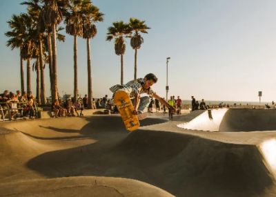 Venice Beach is a must-visit for anyone in Los Angeles, offering a unique blend of local culture, art, and relaxation. Stroll along the lively boardwalk, watch street performers, and soak up the sun on the sandy shores. Don't miss the iconic Muscle Beach gym or the colorful murals that adorn the area, making for perfect photo opportunities.