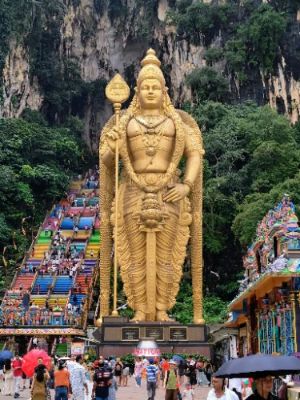 Batu Caves is an awe-inspiring natural wonder featuring stunning limestone hills and a sacred Hindu temple. The vibrant, towering golden statue of Lord Murugan welcomes you at the entrance, while the ancient caves hold rich spiritual significance. Ascend the colorful 272 steps for breathtaking views and unique photo opportunities that truly capture Malaysia's cultural heritage.