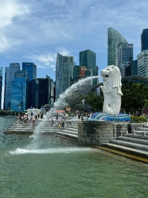 Merlion Park is a must-visit in Singapore, housing the iconic Merlion statue, which embodies Singapore's history and maritime heritage. The park offers breathtaking views of the Marina Bay Sands and the city skyline, especially at sunset. It's the perfect spot for photographs and leisurely strolls along the waterfront.