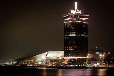 A'DAM Lookout offers stunning 360-degree views of the Amsterdam skyline and its iconic canals. The thrill of standing on the edge while enjoying a drink is unmatched. Don't forget to try the swings that overlook the city for an exhilarating experience—it's a perfect blend of adventure and beauty!