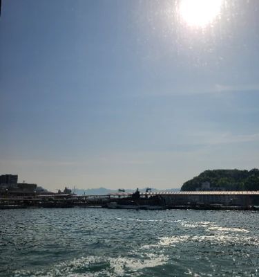 Hiroshima Port is a vibrant gateway to the stunning islands of the Seto Inland Sea. Here, you can enjoy picturesque views while exploring local shops and cafes. It's the perfect starting point for day trips to Miyajima Island and also offers a lovely promenade for leisurely strolls along the water.