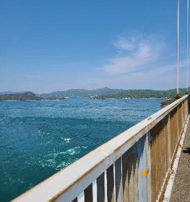 The Kurushima Kaikyo 3rd Bridge is an architectural wonder that offers spectacular panoramic views of the Seto Inland Sea. It's perfect for a leisurely stroll or cycling, allowing you to appreciate the surrounding islands and the strait. Don't forget to bring your camera to capture the stunning sunsets!