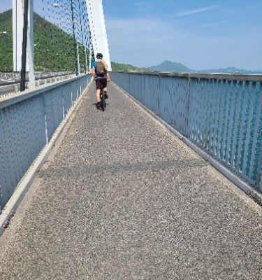 The Tatara Bridge, a stunning suspension bridge in Onomichi, connects the islands of Shimanami Kaido with breathtaking views of the Seto Inland Sea. From its pedestrian paths, you can enjoy panoramic vistas that change with the seasons. It’s a must-visit for anyone looking to appreciate Japan's natural beauty and architectural wonders.
