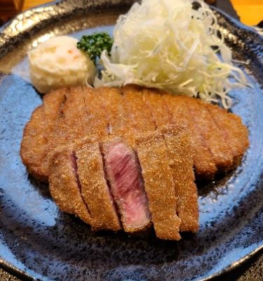 When you visit Beef Cutlet Restaurant Koushuya, you're in for a culinary treat. This cozy spot is renowned for its melt-in-your-mouth beef cutlets, perfectly crispy on the outside and juicy on the inside. The warm atmosphere makes it an ideal place to unwind after a day of exploring the beautiful Lake Kawaguchi area. Don't forget to try their signature dipping sauce!